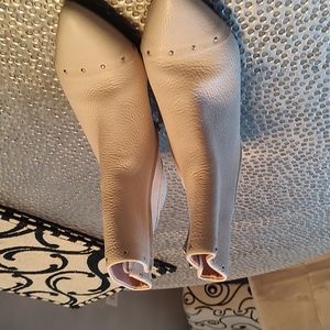 These are cream colored leather boots